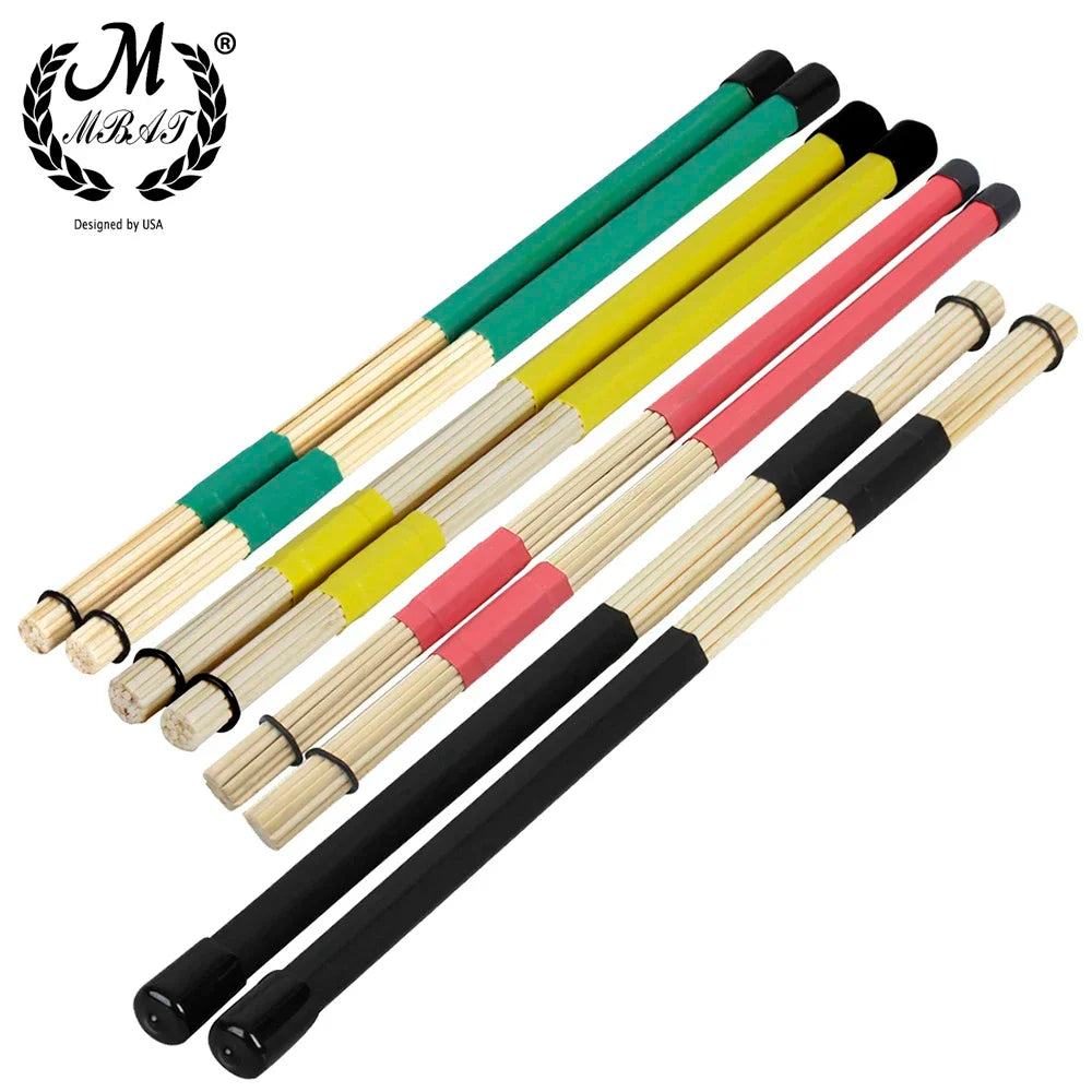Bundled drum rods with green, yellow, pink and black handles arranged diagonally.