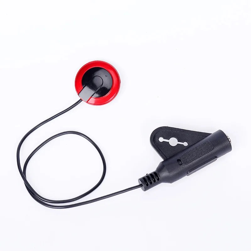 Round red-and-black contact pickup connected by a black cable to a jack socket.